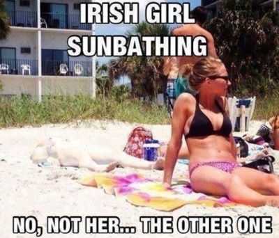 girl-sunbathing-sand-beach